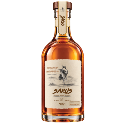 Premium Indian whisky bottle in a sophisticated setting